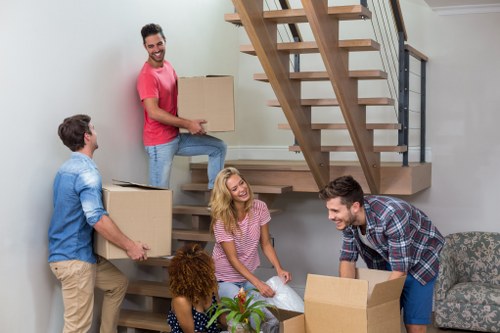 Man With A Van Tolworth service agreement document and moving van imagery