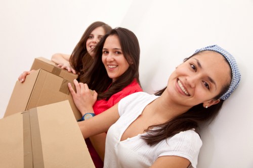 Packed boxes and protective wrapping for a home move in Tolworth