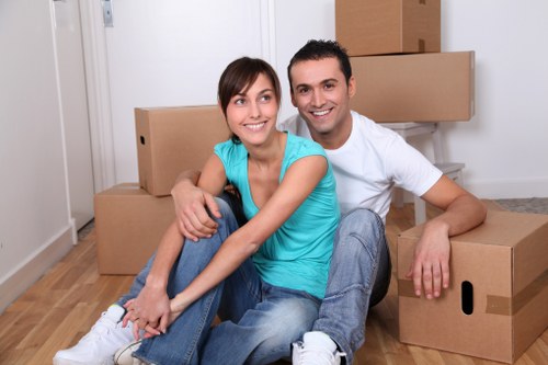 Loading furniture into a van for a move in Tolworth