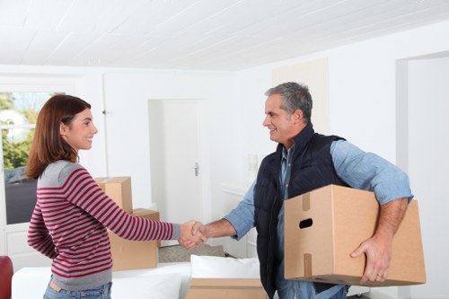 Removal van loading outside a Tolworth property