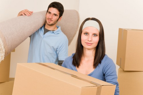 Packed office equipment and furniture prepared for a business move